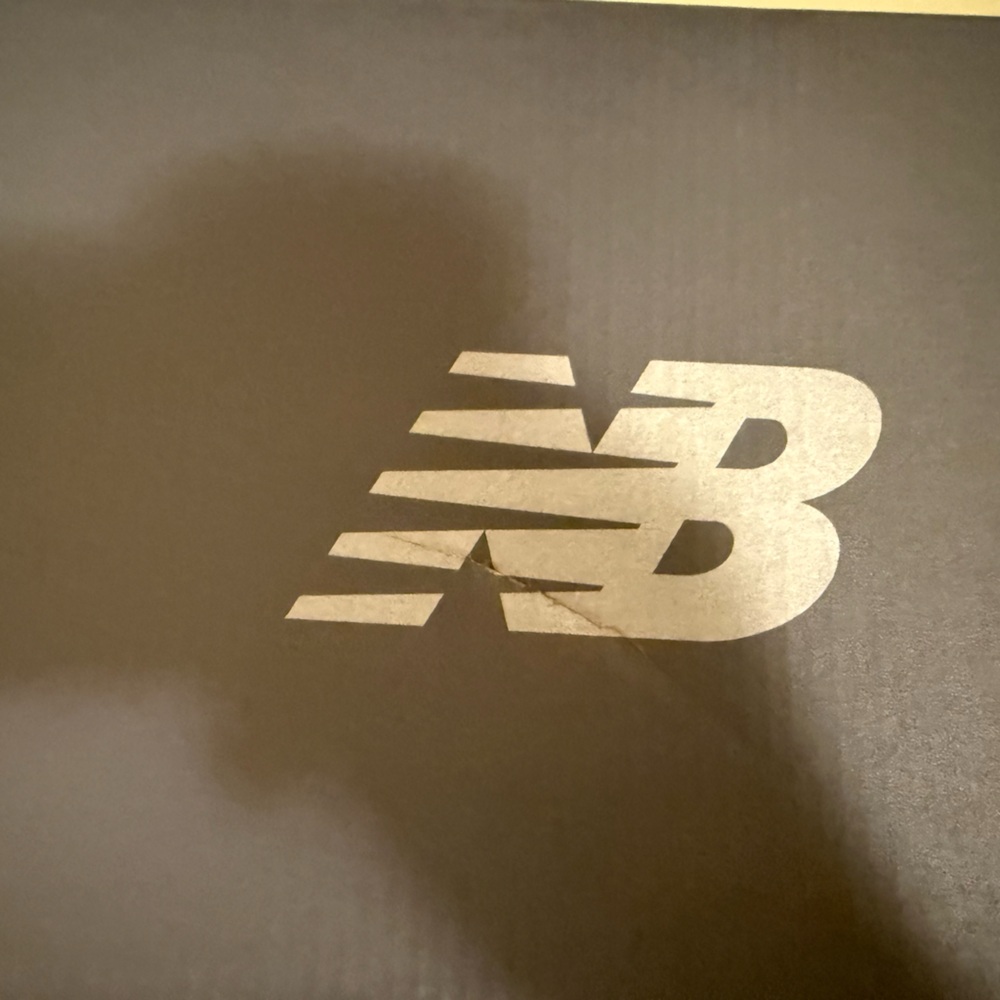 New Balance Black Box with Silver Logo